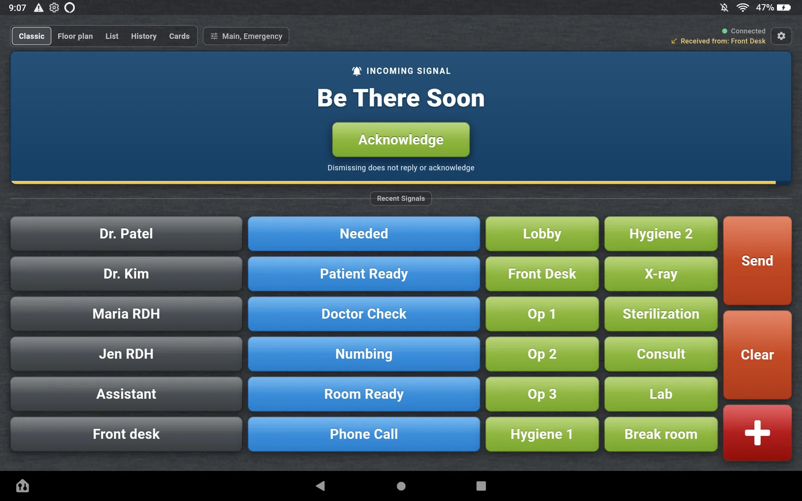 The Op 1 tablet showing the reply Be There Soon as an incoming signal with an Acknowledge button under it, above the Classic board.